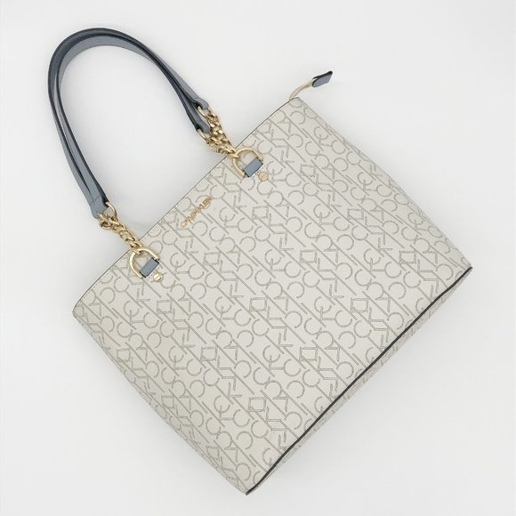 Calvin Klein Handbags - Calvin Klein monogram cream and pale blue Twilight tote purse handbag